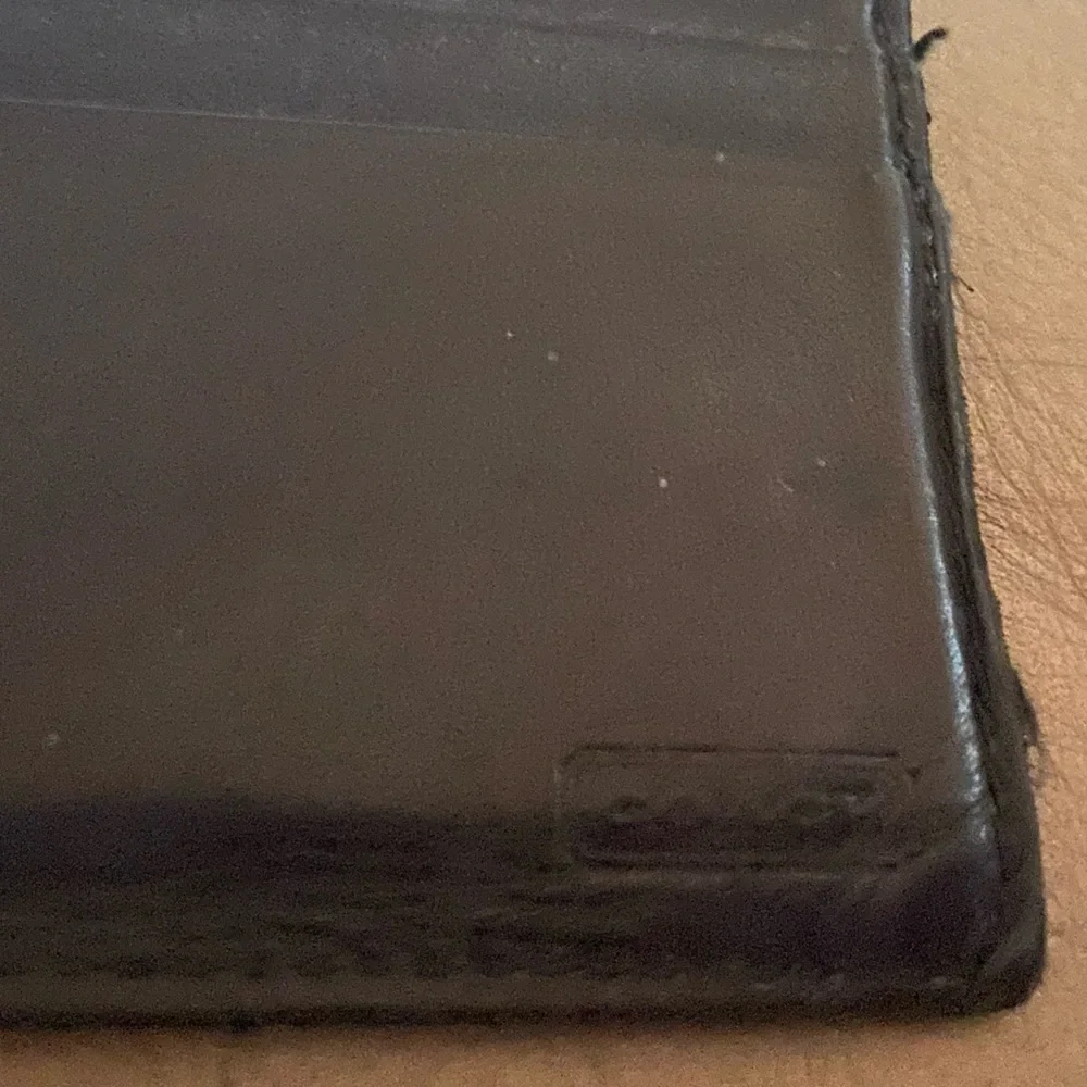 Coach Sleek Black Leather Wallet gently used